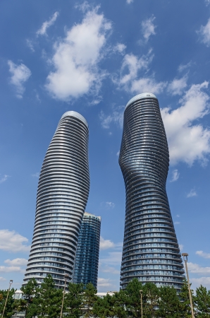 The Absolute World condominium Towers in the city center of Mississauga Ontario on a sunny afternoon  The hourglass shaped tower has been nicknamed the Marilyn Monroe tower due to the curvy shape  のeditorial素材