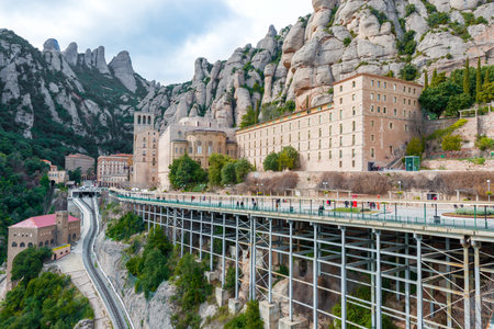 Montserrat, Spain - January 3, 2013  The Benedictine abbey Santa Maria de Montserrat on December 7, 2013 in Monistrol de Montserrat, Spain  It hosts the Virgin of Montserrat, the favorite in Catalonia pilgrimage place of worship のeditorial素材