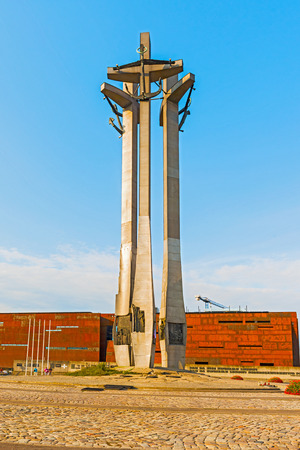 Gdansk, Poland - August 22, 2014: Monument erased in 1981 by Solidarity. It is memorial of workers victims of communist regime.  Three Cross monument is in front of shipyard in Gdansk Poland.のeditorial素材