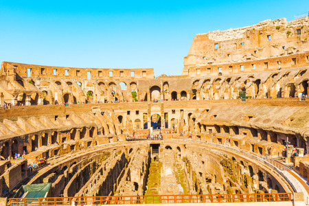 Part of the Flavian Amphitheatre known as the Coliseum. it is one of the main tourist attractions of the city of Rome and is visited by many touristsの写真素材