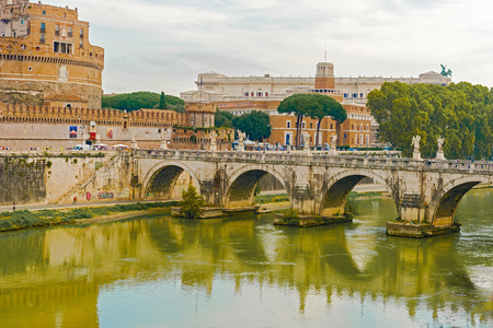 Rome, Italy - August 31, 2014: Tourists walking over St. Angelo Bridge in Rome.  Pedestrian bridge, built in 134AD with travertine marble fascias and spanning the River Tiberのeditorial素材