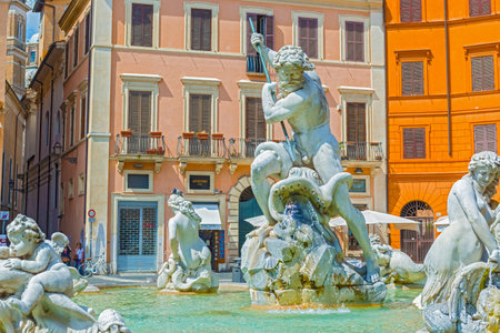 Rome, Italy - August 31, 2014: Toursists visiting Fountain of Neptune on Piazza Navona in Rome on August 31, 2014. Fountain was built in 1574 to a design by Giacomo Della Porta.のeditorial素材