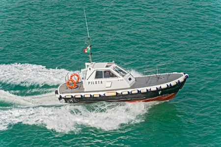 Civitavecchia, Italy - September 4, 2014: Harbour pilot boat cruising in Civitavecchia Italian harbour near Rome on September 4, 2014.のeditorial素材
