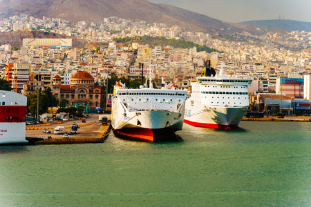 Pireus, Greece - September 8, 2014: Big ferries boats in the passenger port of Piraeus, Athens.のeditorial素材