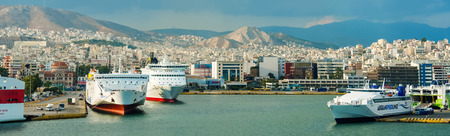 Pireus, Greece - September 8, 2014: Big ferries boats in the passenger port of Piraeus, Athens.のeditorial素材