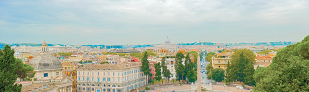 Cityscape of Rome, Italy. Panorama of Rome with St. Peter Basilica at the background.の写真素材