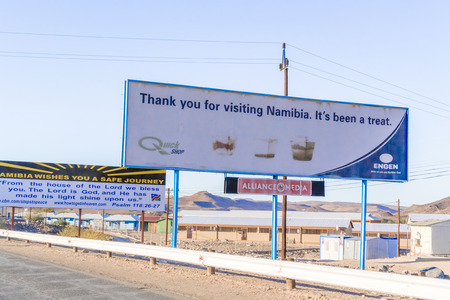 Vioolsdrfif, South Africa - May 3, 2015: Signs at the border between Namibia and Soth Africa.のeditorial素材