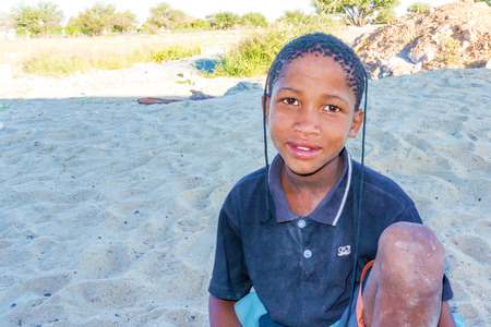 Witvlei, Namibia - April 20, 2015: The boy in Namibia poses for the picture taken in Witvlei, Namibiaのeditorial素材