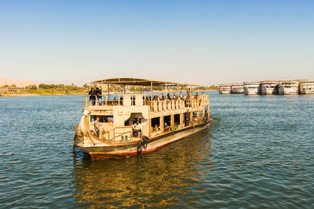 Luxor, Egypt - January 15, 2015: Tourists on the boat sailing on the river Nile in Luxor, Egypt.のeditorial素材