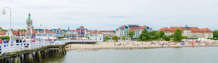 Sopot, Poland - July 21, 2015: View of the beach in Sopot, a major health-spa and tourist resort on the Polish Baltic Sea coast with two luxury hotels, old style Grand Hotel and modern Sheraton.のeditorial素材