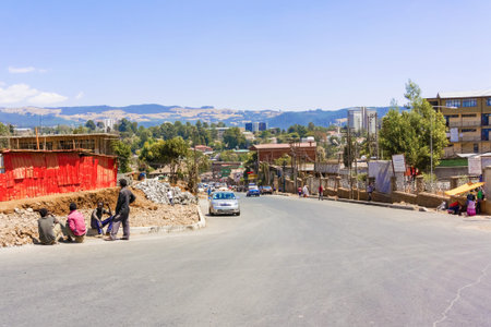 Addis Ababa, Ethiopia - February 19, 2015: People and businesses on a street in central Addis Ababa, the capital of Ethiopia and one of the largest cities in Africaのeditorial素材