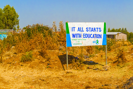 Bahir Dar, Ethiopia - February 11, 2015: Education promoting sign on the side of the road in Bahir Dar, Ethiopia.のeditorial素材