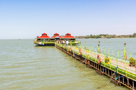 Bahir Dar, Ethiopia - February 11, 2015: People walking ont the pier on Lake Tana in Bahir Dar. Bahir Dar is one of the leading tourist destinations in Ethiopia, with a variety of attractions in the nearby Lake Tana and Blue Nile river.のeditorial素材
