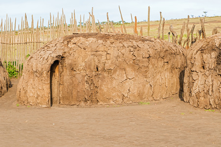 Serengeti, Tanzania - March 12, 2015: View at the houses in Masai village in Tanzania near Serengeti National Park on March 12, 2015.のeditorial素材