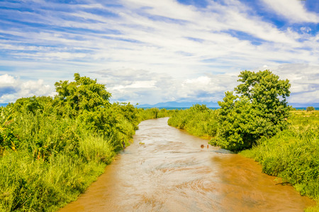 Landscape view at the river running to lake Malawi in Karonga in Malawi.のeditorial素材