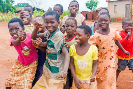 Dzoole, Malawi - March 30, 2015: Group of young children playing at the road in small village of Dzoole in Malawi.のeditorial素材