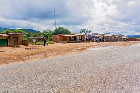Chongwe, Zambia - April 2, 2015: People in front of the stores in small village of Chongwe in Zambiaのeditorial素材