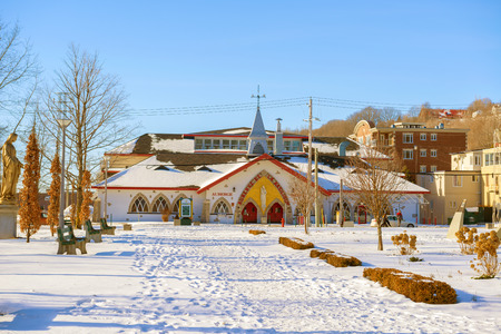 Beaupre, Canada - January 21, 2016: Facade of the hotel in front of The Basilica of Sainte-Anne-de-BeauprÃ© is a basilica set along the Saint Lawrence River in Quebec, Canadaのeditorial素材