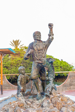 Puerto Ayora, Galapagos, Ecuador - April 6, 2016: Sculpture dedicated to fruits of the sea , tu fruto, tu mar is located in the city of Puerto Ayora on Santa Cruz island in Galapagosのeditorial素材