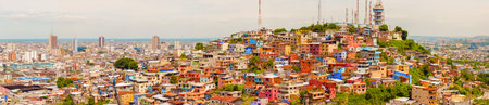 Guayaquil, Ecuador - April 16, 2016: Panoramic view at the cell phone towers and colorful houses of Guayaquil's Cerro Santa Ana neighborhood.のeditorial素材