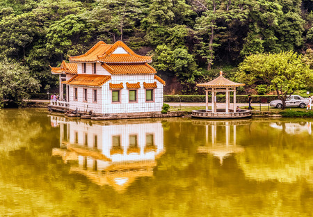 Foshan, China - May 1, 2008: People at the House by the river in Foshan China.の写真素材