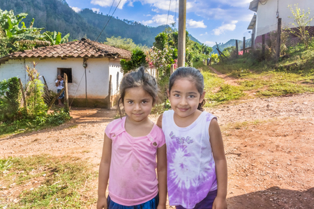 Copan district, Honduras - November 30, 2016: Two girls in rural area in the highlands of Honduras.のeditorial素材