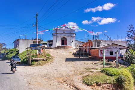 Chichicastenango, Guatemala - December 9, 2016: Catholic church at the road near small town of Chichicastenango in the highlands of Guatemala.のeditorial素材