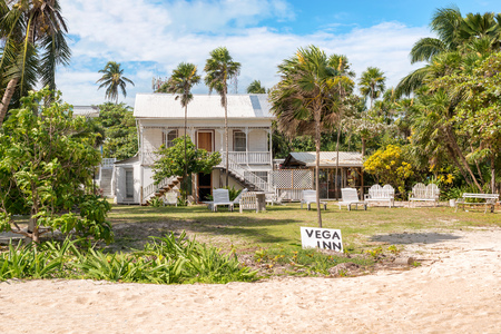 Caye Caulker, Belize - December 20, 2016: View at the colorful wooden house in Caye Caulker. It is a small island near Ambergris Caye, Belize.のeditorial素材