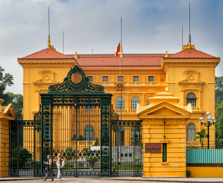 Hanoi, Vietnam - October 27, 2017: Tourists in front of The Presidential Palace of Vietnam. It is located in the city of Hanoi, was built between 1900 and 1906 to house the French Governor-General of Indochina.のeditorial素材