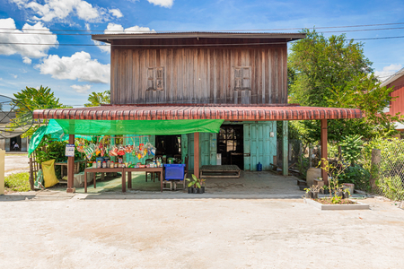 Muang Khong, Laos - November 9, 2017: Store in the lower level of the stand alone wooden house at the bank of Mekong river in Muang Khong, Laos.のeditorial素材