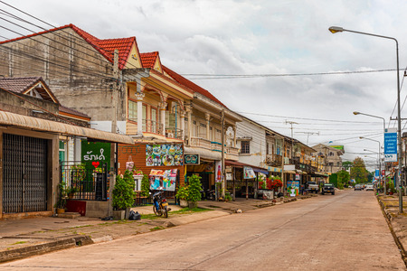 Savannakhet, Laos - November 5, 2017: View at the street with old French Colonial Buildings with fading paint and chipped concrete in Savennakhet Laos.のeditorial素材