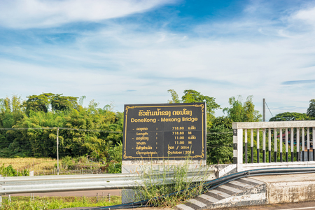 View at DoneKong bridge entrance sign. It is the bridge over Mekong near Muang Khong, Laos.のeditorial素材