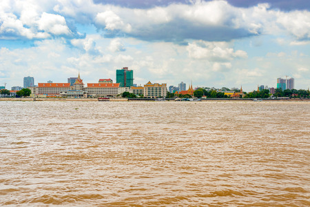 The skyline of Phnom Penh as seen over the Mekong river, Cambodia.の写真素材