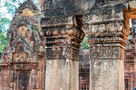 Banteay Srei is 10th century Cambodian temple dedicated to Hindu god Shiva. Located 25km of main group of temples. It is built largely of red sandstone, and have elaborate decorative wall carvingsの写真素材