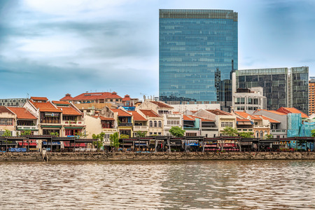 Singapore - Jan 14, 2018: Colorful bars, restaurants and stores  by the Singapore River along Clarke Quay. Once a warehouse, the area is now major tourists attraction and landmark area in Singapore.のeditorial素材