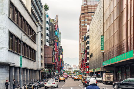 Taipei, Taiwan - Jan 16, 2017: Office and hotel buildings along Zhongxiao West Road in downtown of Taipei, Taiwan.のeditorial素材