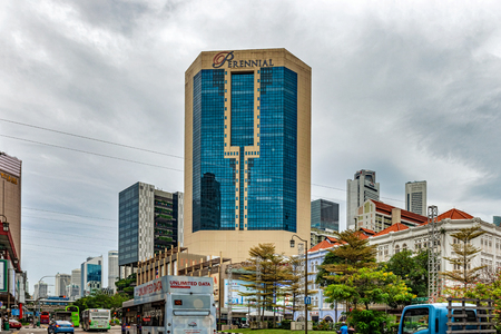 Singapore January 10, 2018: Colonial buildings along New Bridge Road and city skyscrapers at the background in the city of Singapore.のeditorial素材