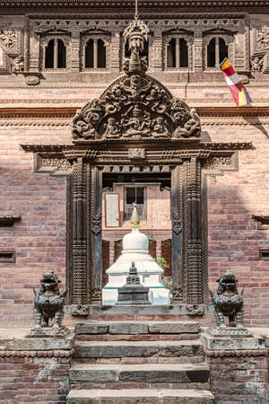 View at the ancient doors opening to Royal Palace in Bahtapur, Nepalの写真素材
