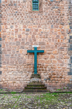 Cross at the Facade of the Iglesia del Triunfo, Church of The Triumph, adjacent and joined to the cathedra. It is the first Christian church to be built in Cusco, Peru.の写真素材
