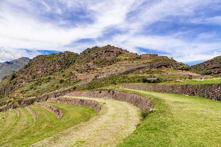 View at the agriculture Inca plants farming terraces at archeological Park in Sacred Valleys of Incas in Pisaq near Cusco in Peru.の写真素材