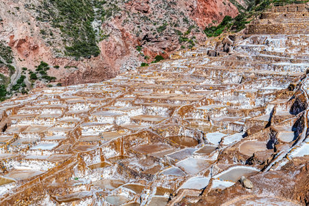View at Salinas de Maras, man made salt evaporation pond called also salt mines near town of Maras in the Sacred Valley of the Incas and near Cusco in Peru.の写真素材