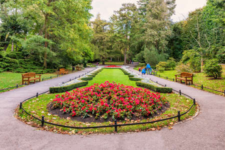 View at the walkway in the Park located just by famous cathedral in Gdansk, Oliwa, Polandの写真素材