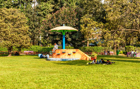 Kathmandu, Nepal - Oct 10, 2018: People resting in Sankhadhar Park also called Ratna Park in the city of Kathmandu, Nepal.のeditorial素材