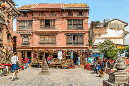 Kathmandu, Nepal - Oct 11, 2018: Tourists visiting temples complex Harati Ajima Temple, Dongchu monastery located on the hill at Swayambhunath Stupa and overlooking city of Kathmandu in Nepal.のeditorial素材