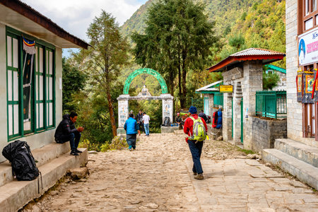 Lukla, Nepal - Oct 25, 2018: View at The Pasang Lhamu memorial gate in Lukla village on the Everest...