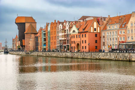 Gdansk, Poland â Feb 14, 2019: The classic view of Gdansk with the historic Gdansk Crane and the Hanseatic-style buildings along River Motlawa, Poland.のeditorial素材