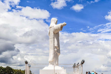 Statue of Cristo Blanco, White Christ. It is located on top of Red Hill, Pukamuqu, at 3600m height and it is natural viewpoint of the Cusco city in Peru.のeditorial素材