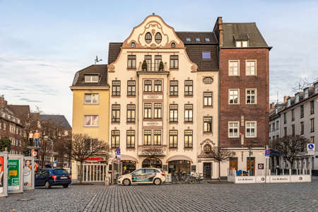 Dusseldorf, Germany - Jan 29, 2019: View at the facade of old picturesque building at Burgplatz square next to River Rhine in Dusseldorf, Germany.のeditorial素材