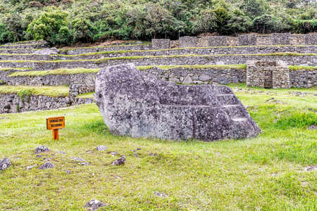 View at the Ceremonial Rock in ancient Incas city of Machu Picchu near Cusco in Peru.のeditorial素材