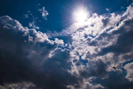 Beautiful nimbus on the backgroud of the sunの写真素材